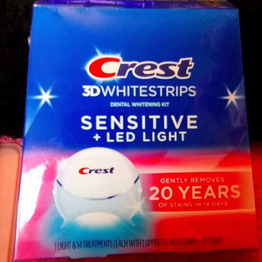 Crest whitening kit with LED light sensitive